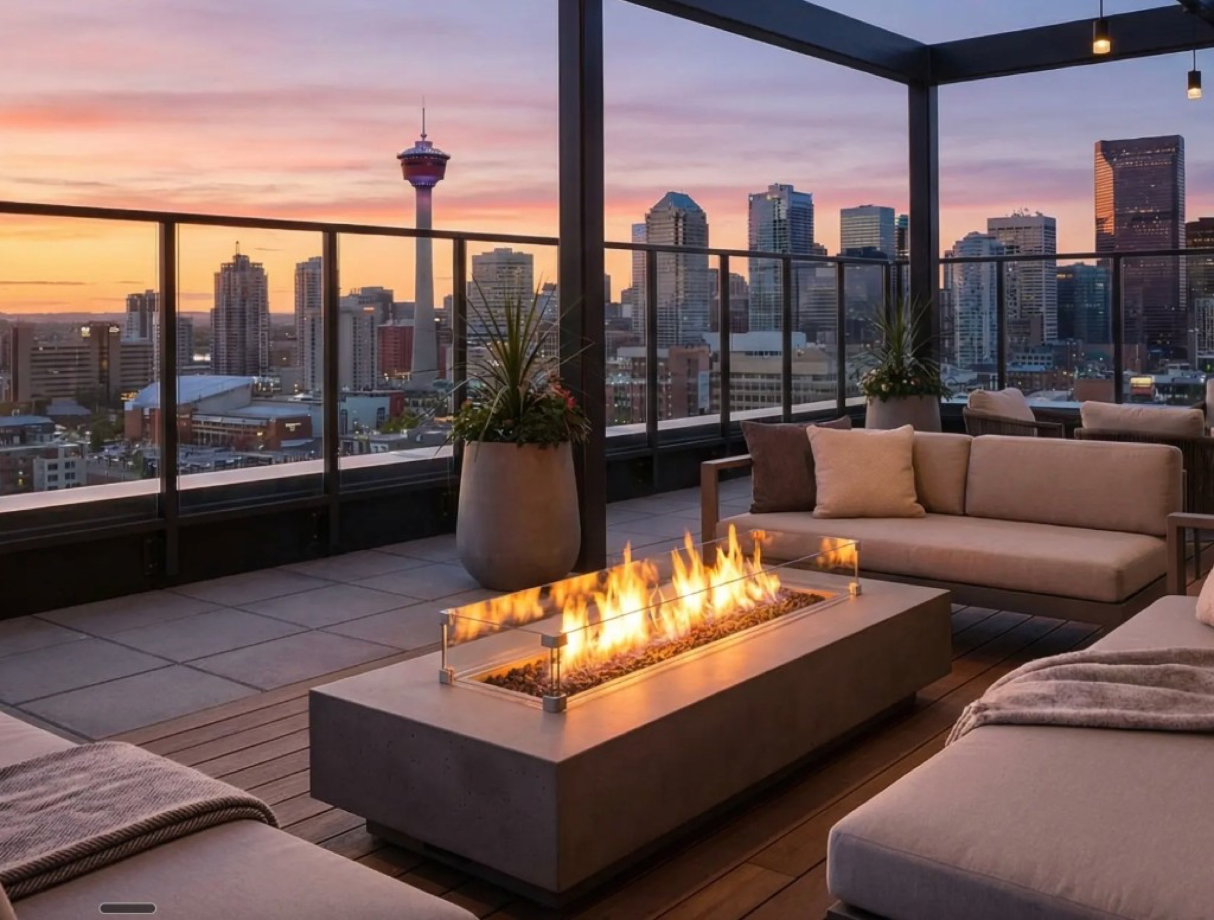 Calgary skyline from a rooftop terrace at sunset